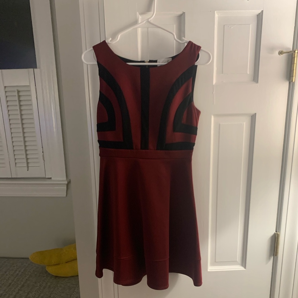 Lovely Maroon Dress With Black Designs